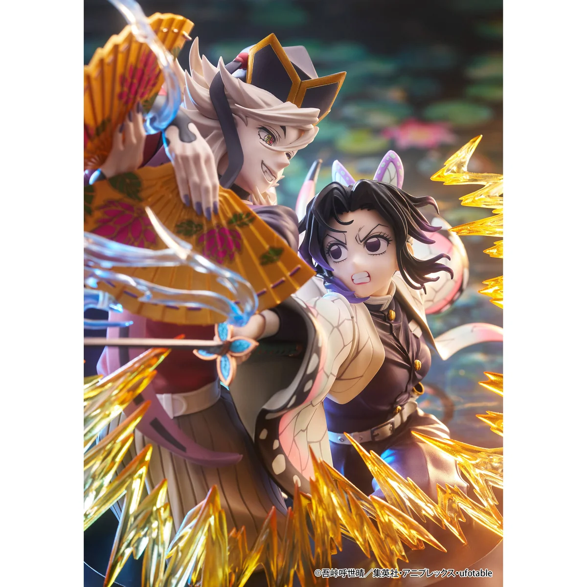"Official Demon Slayer Shinobu Kocho vs Doma dynamic statue. Exquisite sculpted details and intense battle scene shown from various angles."