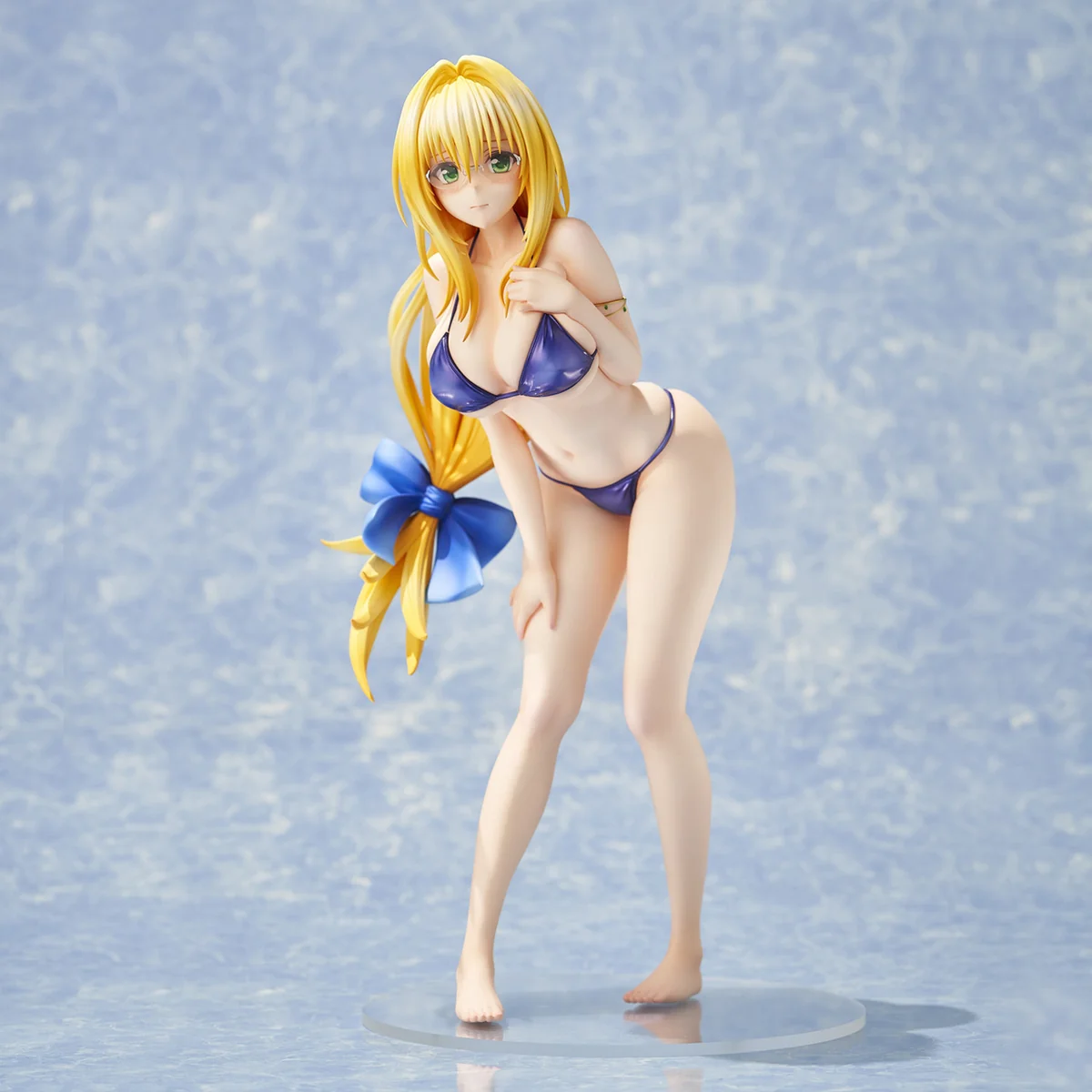 "Tearju Lunatique Swimsuit Re-issue statue. Dynamic, alluring pose with vibrant aquatic effects, showcasing a premium sculpt of the iconic To LOVE-Ru."