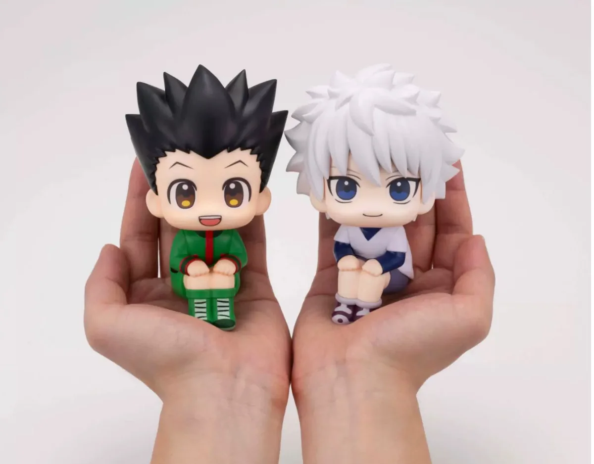 Official MegaHouse Hunter x Hunter Gon & Killua chibi figures set, displaying adorable upward-gazing poses and intricate sculptural details from variable angles.