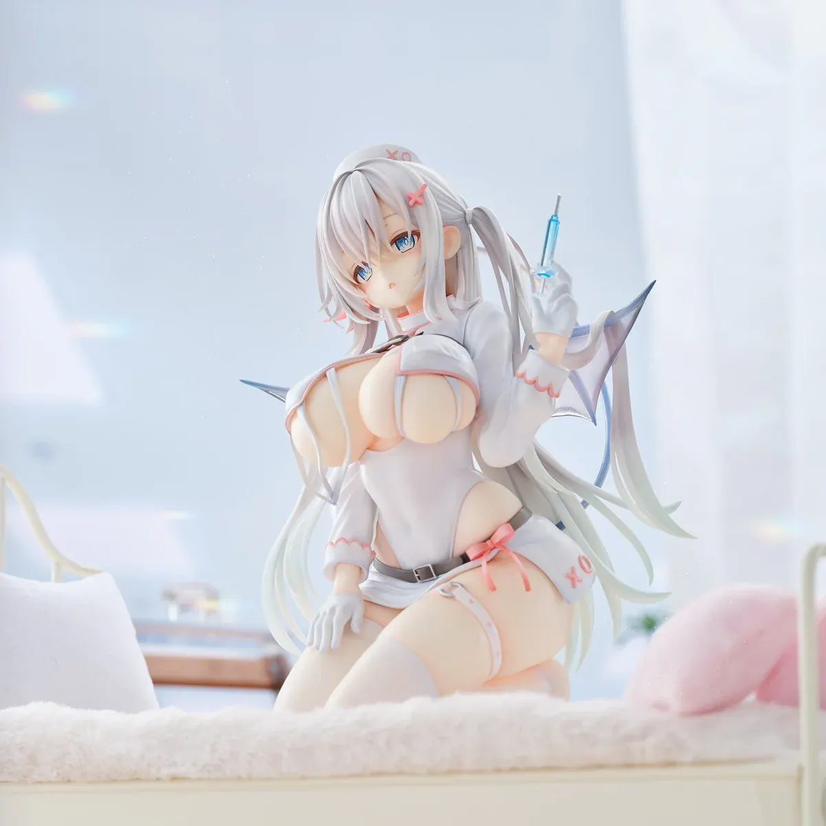 "Exquisite Succubus Nurse Makina figure by Union Creative, showcasing her alluring nurse outfit, detailed wings, and medical accessories from multiple."