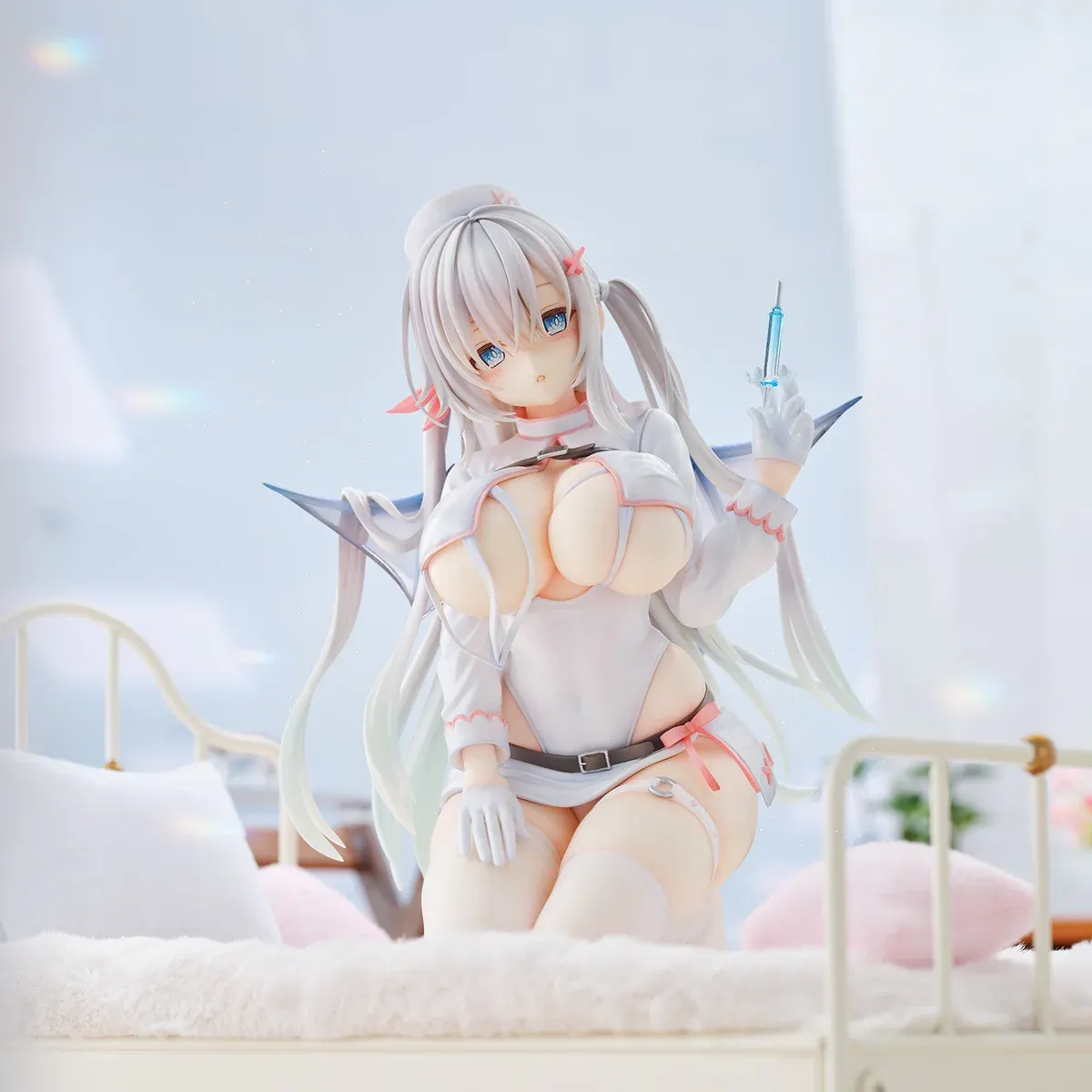 "Exquisite Succubus Nurse Makina figure by Union Creative, showcasing her alluring dynamic pose, detailed wings, and medical accessories."