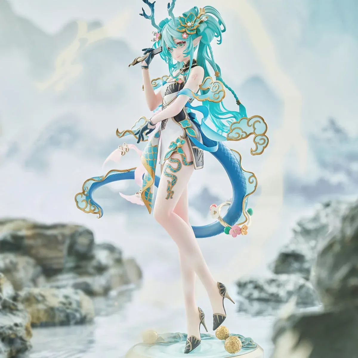 "Premium 1/7 Hatsune Miku Azure Dragon figure showcasing Miku's majestic transformation with flowing water and ethereal power, a Kaiyodo Studio master."