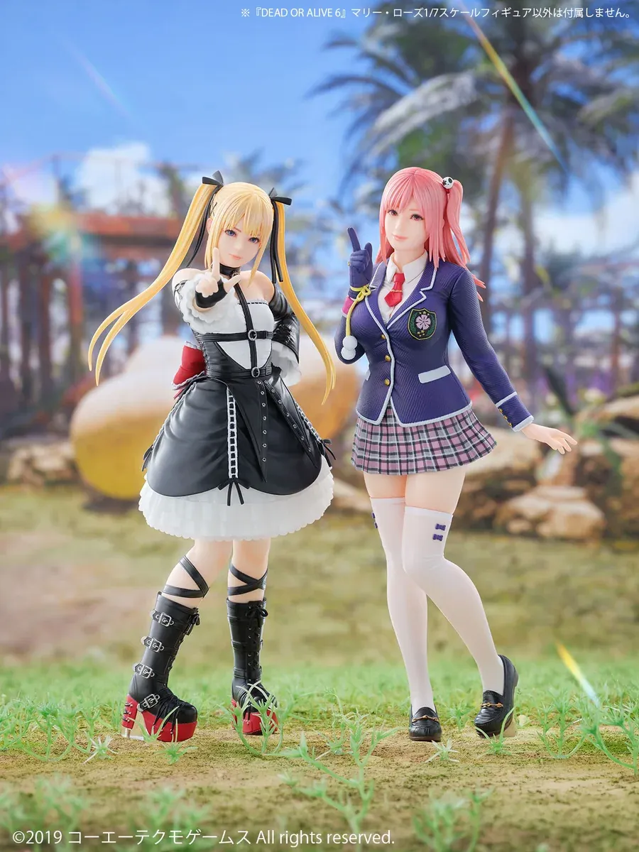 "Authentic 1/7 scale PVC figures of Marie Rose & Honoka from Dead or Alive 6, captured in dynamic poses with vibrant, faithful game details."