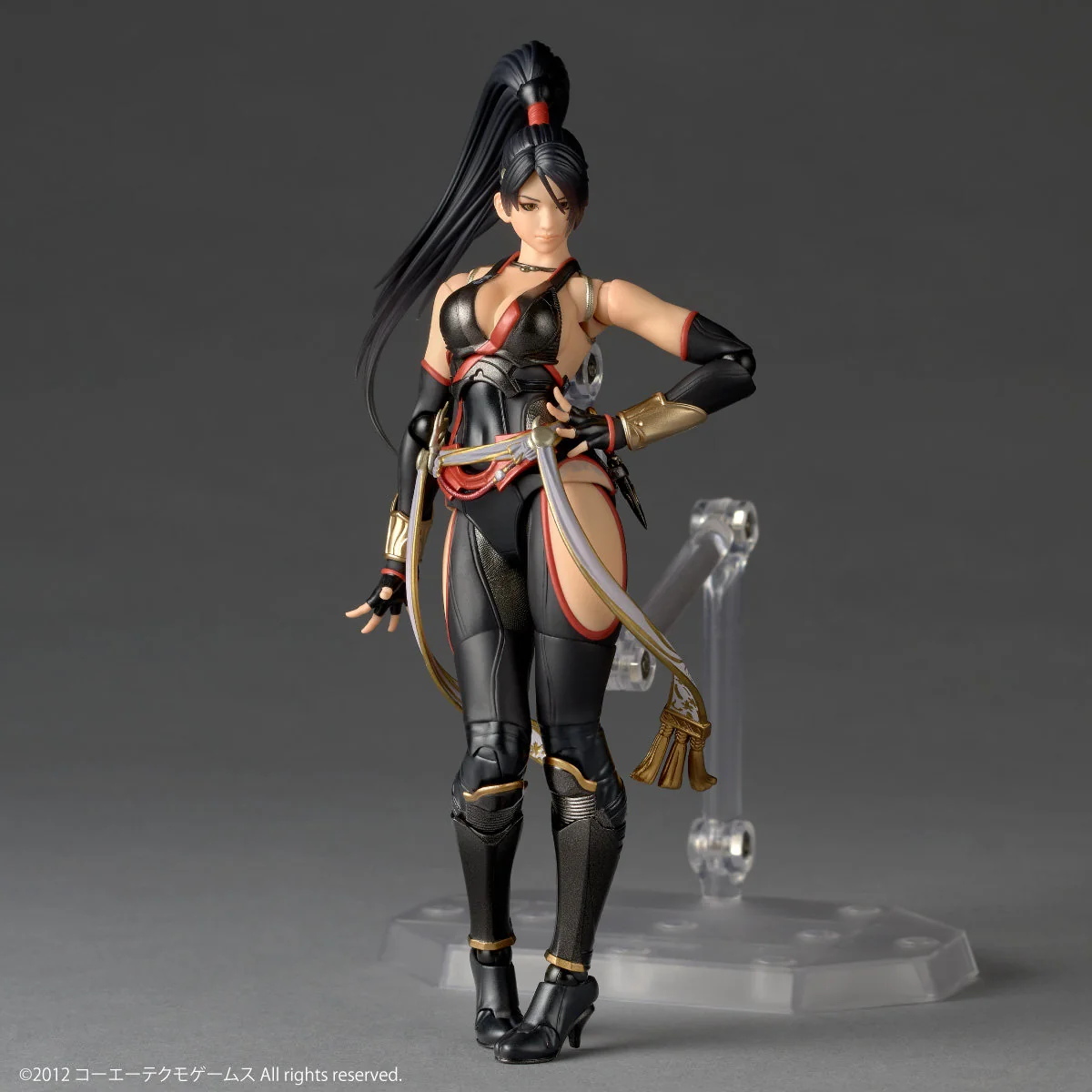 "Dynamic main display of the ultimate poseable Ninja Gaiden Momiji figure by Kaiyodo Studio, showcasing her fierce warrior aesthetic."