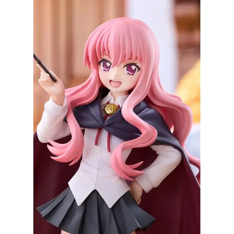 This close-up captures the Good Smile Company Louise Pop Up Parade L Size figure as the pink-haired mage in a navy cape playfully casts with her wand.