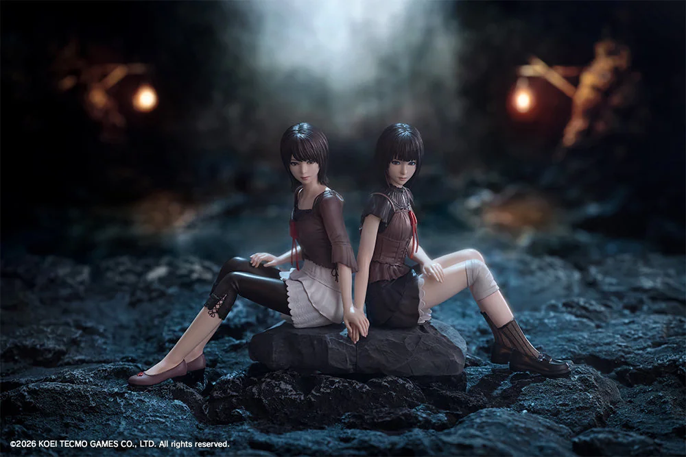 Kotobukiya Fatal Frame II statue of Mio and Mayu Amakura seated back-to-back on dark rock in an eerie cave, evoking the Zero Crimson Butterfly figure.