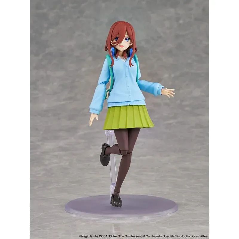 "Authentic KADOKAWA Nakano Miku Model Kit. Multiple angles showcase charming school uniform, iconic headphones, and anime details."