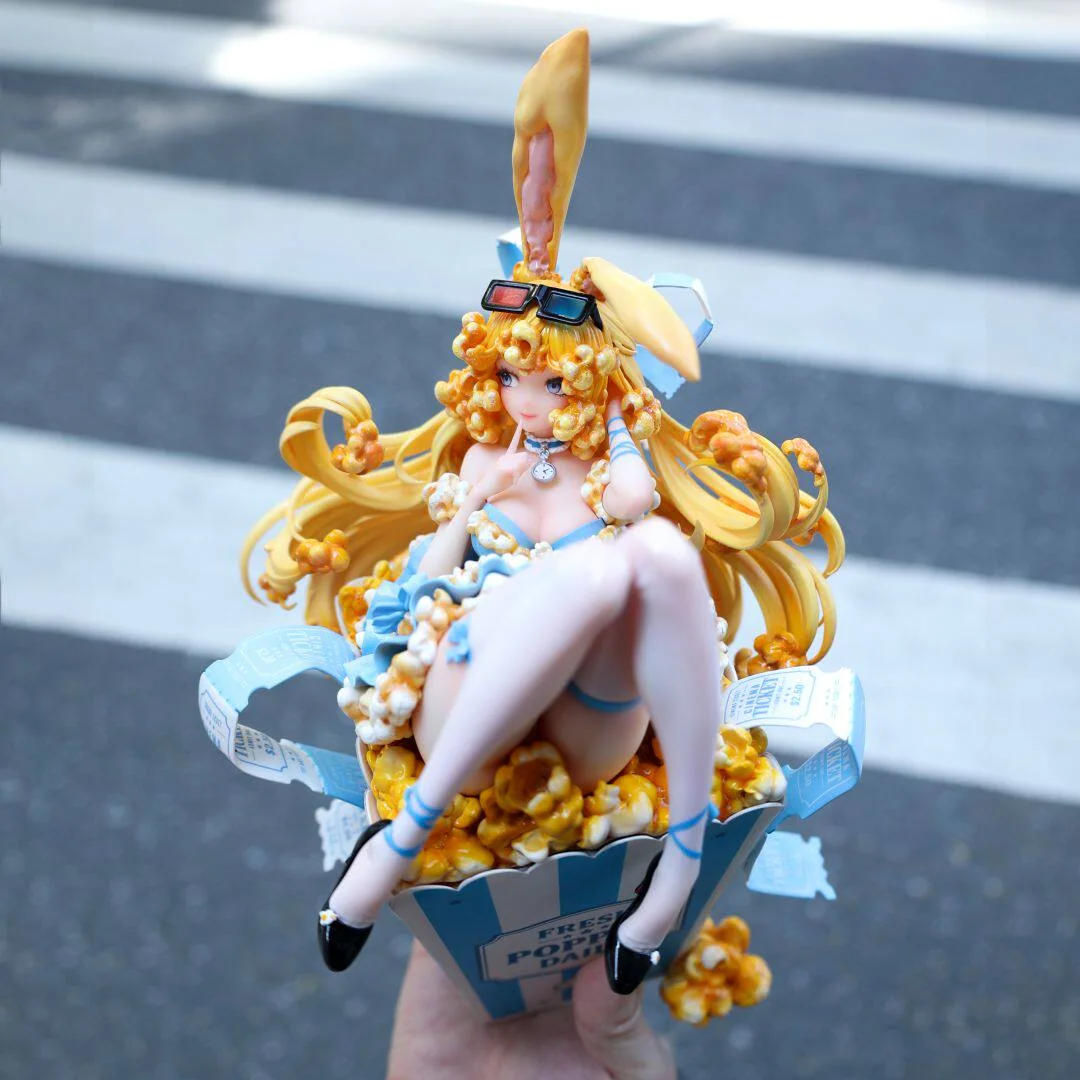 Popcorn Fairies figure with popcorn curls, candy bunny ears, 3D glasses, and retro popcorn bucket base, hand-sculpted PU resin limited to 499 units.