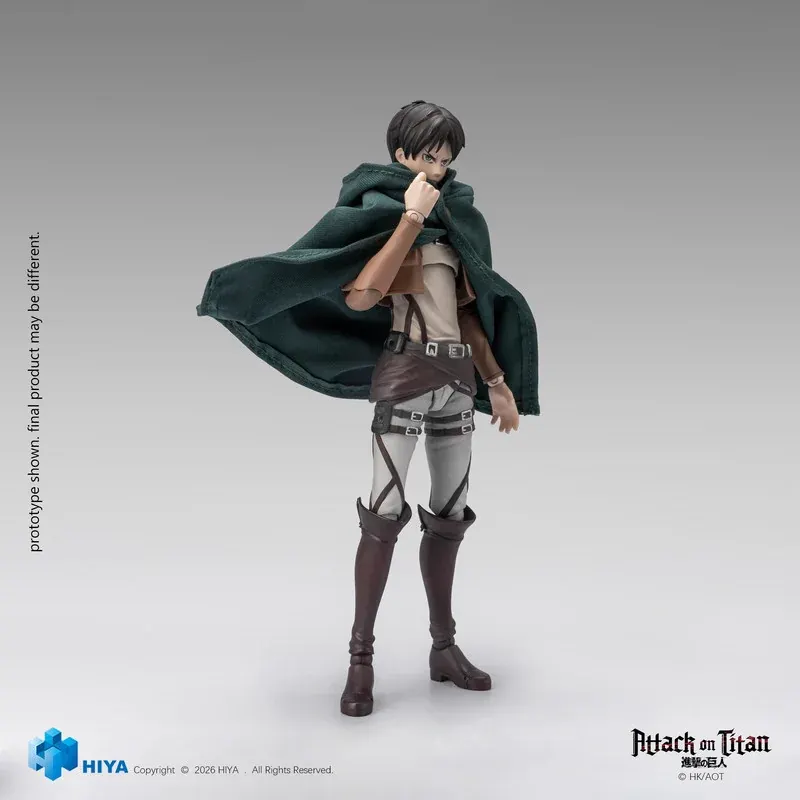 HIYA Studio 1/12 Eren Yeager figure with green Survey Corps cloak and ODM gear, fully articulated for dynamic Attack on Titan poses.